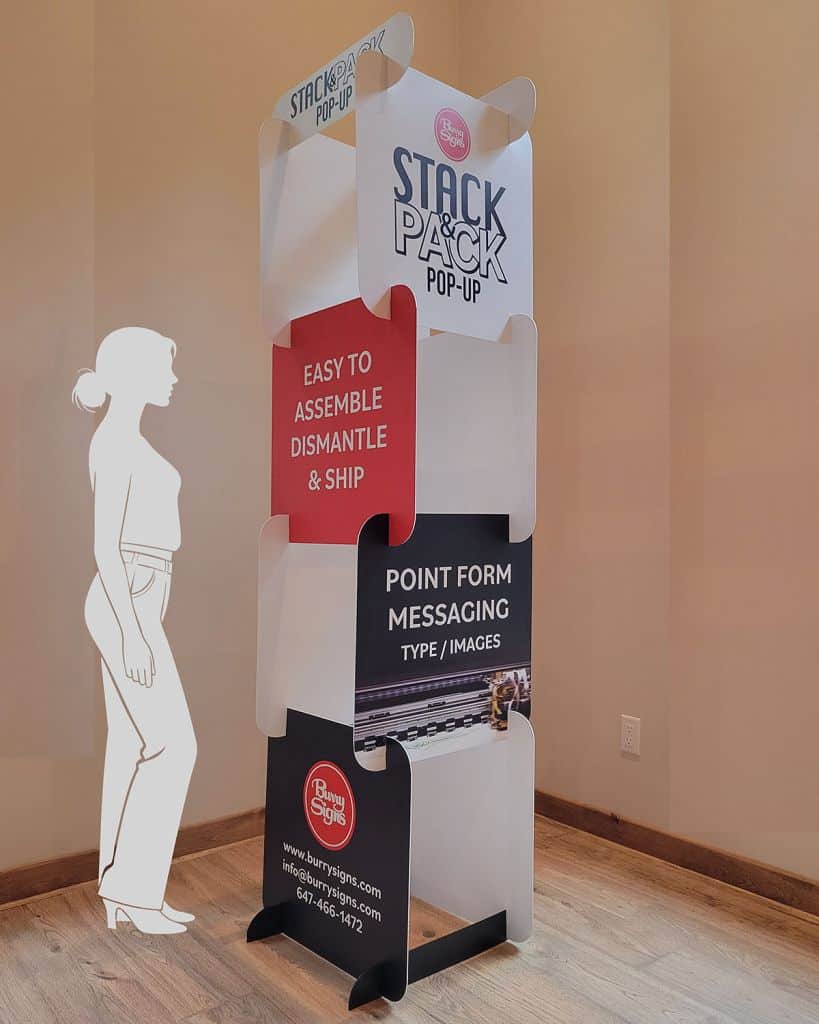 Stack&Pack Pop‑Up Display System modular signage tower in workshop